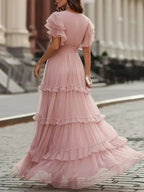 Rosalía | Vestido Maxi Rosa Empolvado con Escote en V, Volantes Escalonados y Mangas Mariposa