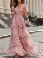 Rosalía | Vestido Maxi Rosa Empolvado con Escote en V, Volantes Escalonados y Mangas Mariposa